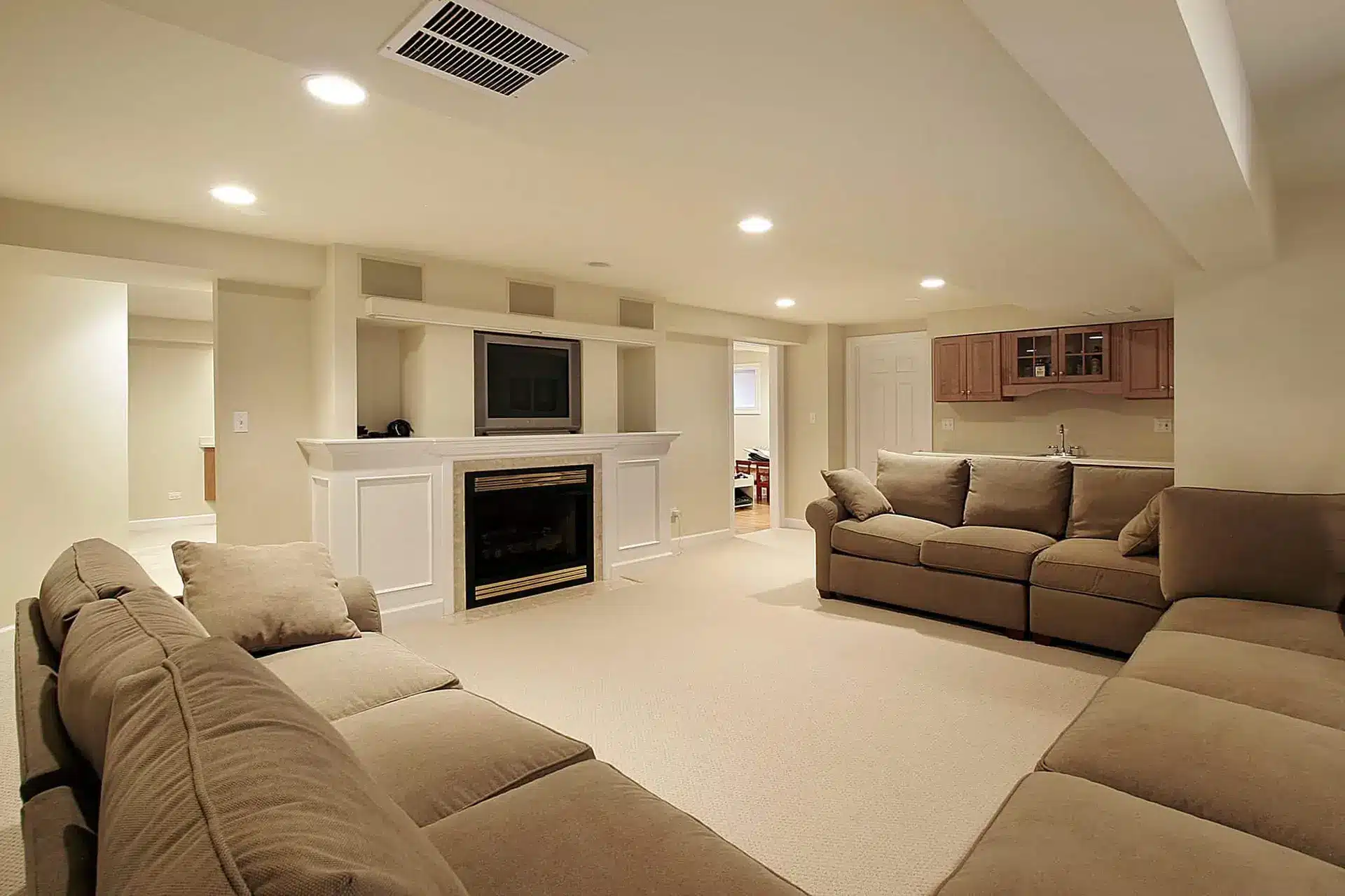 basement-with-fireplace-and-bar