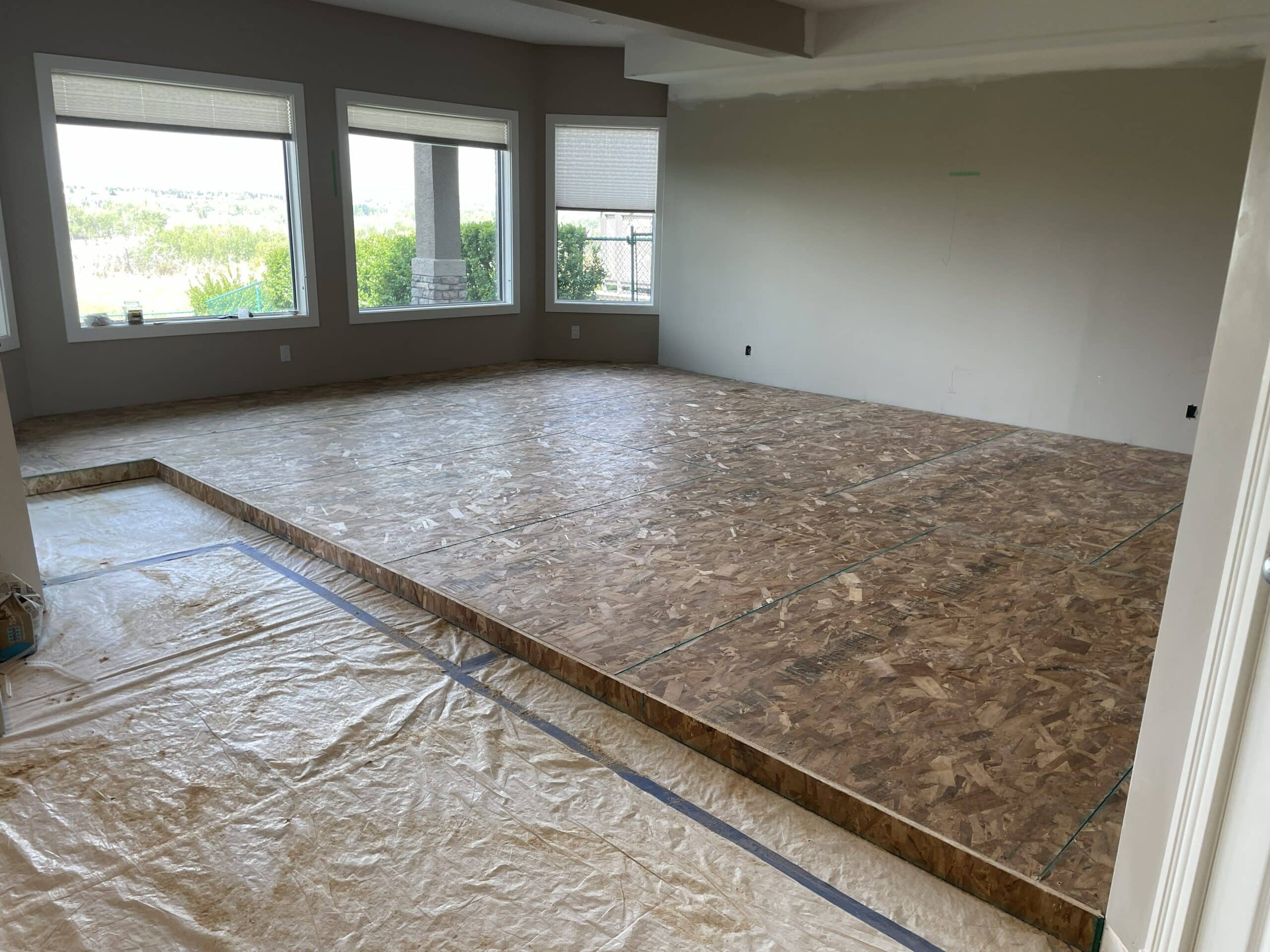 Raised subfloor installation for Mt Douglas Cir SE basement dance studio renovation in Calgary
