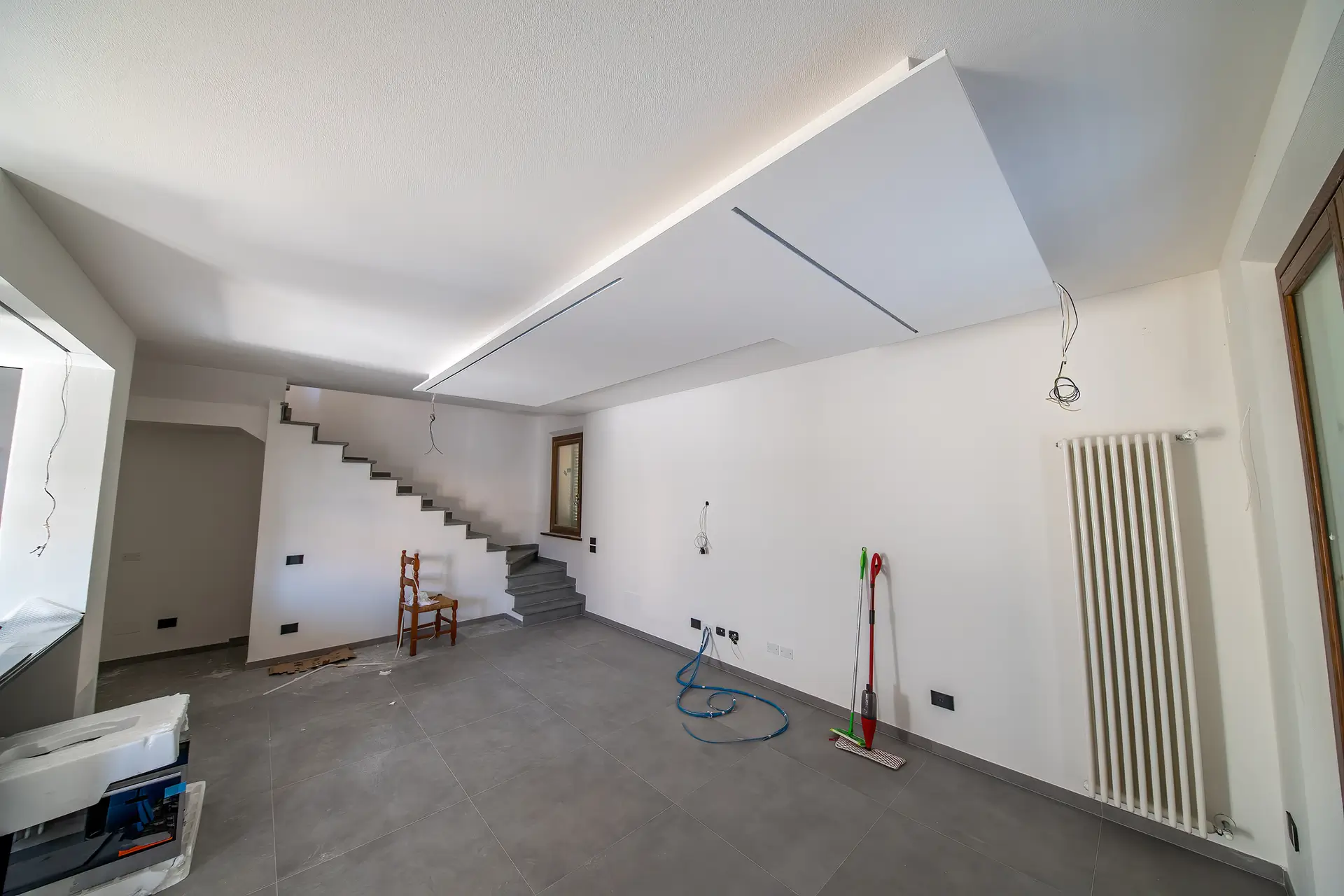 Basement drywall ceiling under construction before finishing
