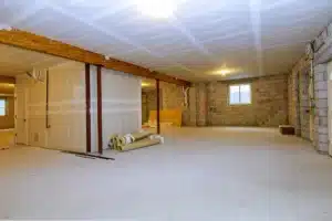 Unfinished new-build basement interior before development